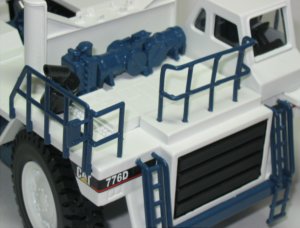 Cat 776D with Mega bottom dump trailer