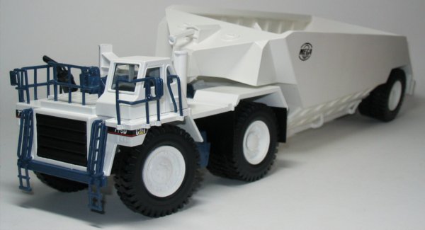 Cat 776D with Mega bottom dump trailer