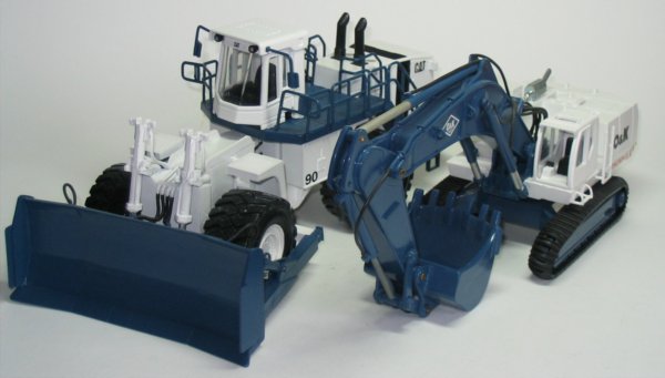 Cat 854G wheel dozer with O&K RH30F Excavator