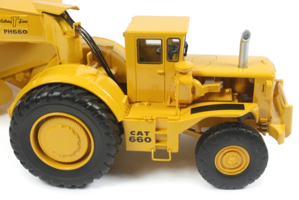 Caterpillar 660 with Athey bottom-dump coal hauler