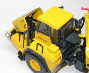 Komatsu HM400 with Mega 6000 water tank