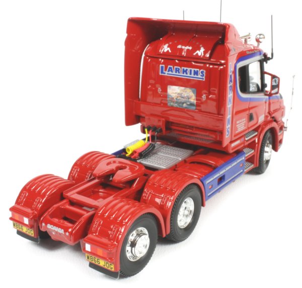 Scania T with drop-side trailer and Moffett Mounty
